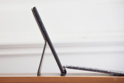 The Asus Chromebook Detachable CM3 open from the right side.